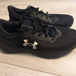 Womens black Under Armour running shoe. Size 8.5